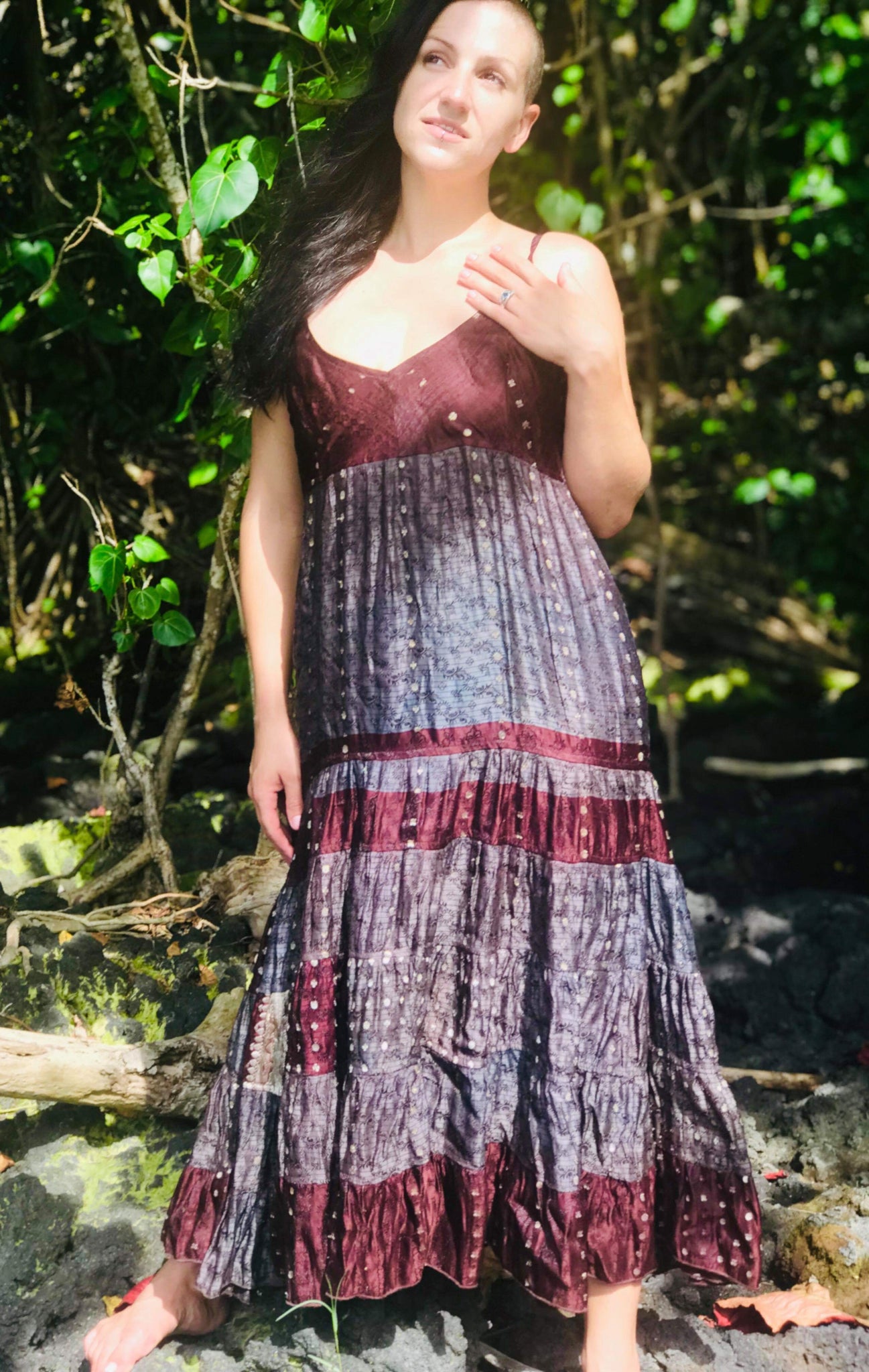 indian silk boho dress Crafted from luxurious Indian Silk, this beautifully flowing dress features a flattering high-waist silhouette designed to enhance and shape the torso. The elasticated waist, paired with an adjustable tie-up front, allows for